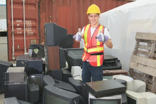 Inspector reviewing supplier documentation at a waste site