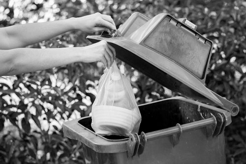 Man and van collecting furniture during a terraced house clearance near Norbiton Station